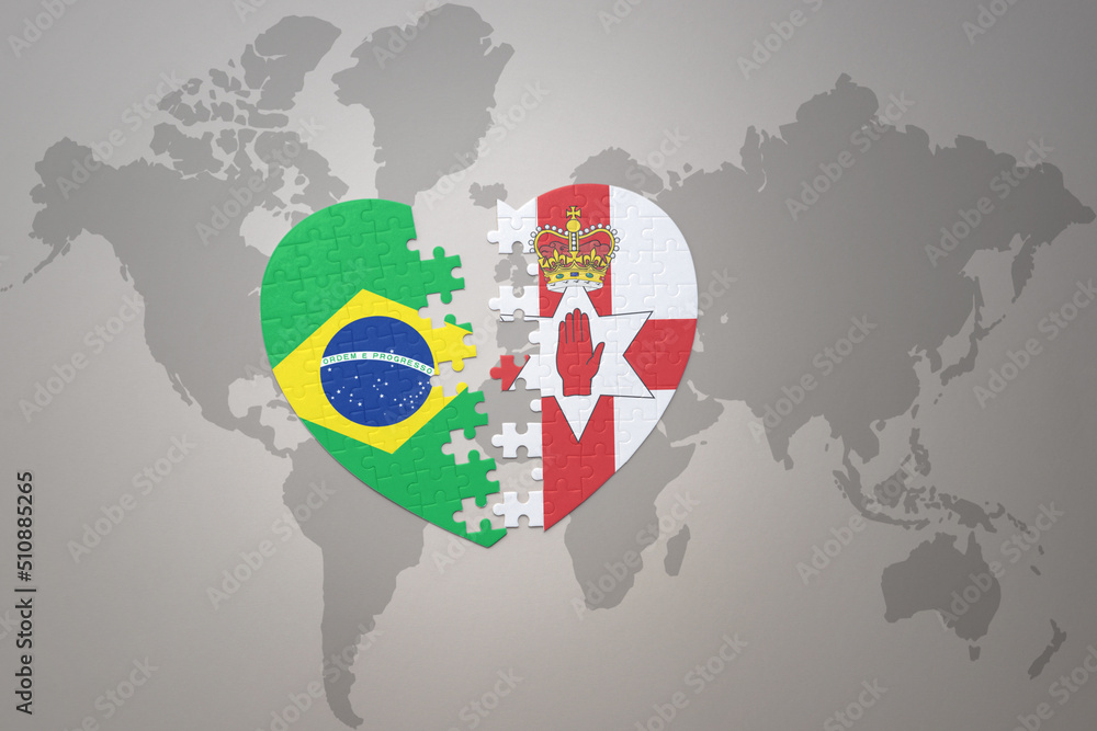 puzzle heart with the national flag of brazil and northern ireland on a ...