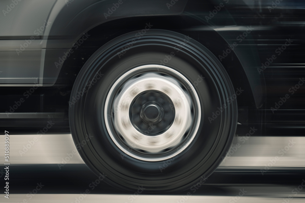 Fast Spinning Truck Wheels. Truck Speed Driving on the Road. Transportation. Fast Spinning Truck Wheels. Truck Speed Driving on the Road. Transportation.