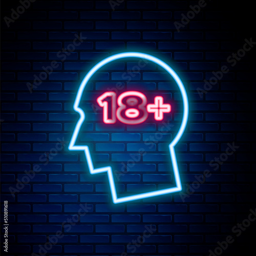 Glowing neon line Human head with inscription 18 plus icon isolated on brick wall background. 18 plus content sign. Adults content only icon. Colorful outline concept. Vector