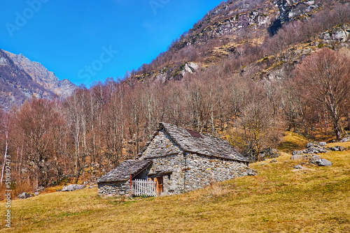 The old barn on the slope, Mora di Fuori, Valle Verzasca, Switzerland photo