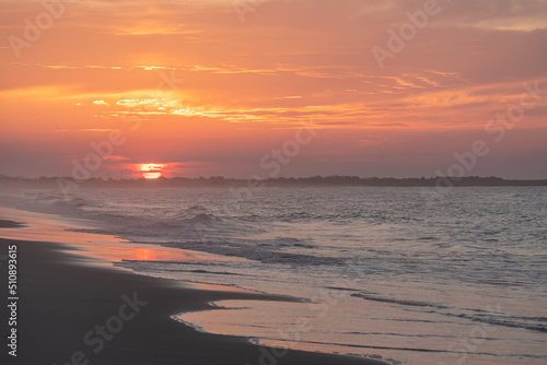 Ocean waves at sunrise off the shore of Cape May   New Jersey USA