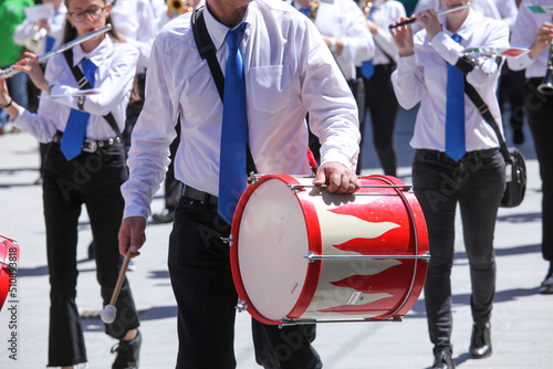 city bands with instruments for fanfare and military musician marches photo