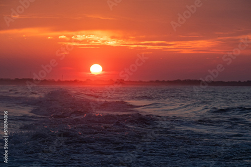 Ocean waves at sunrise off the shore of Cape May   New Jersey USA