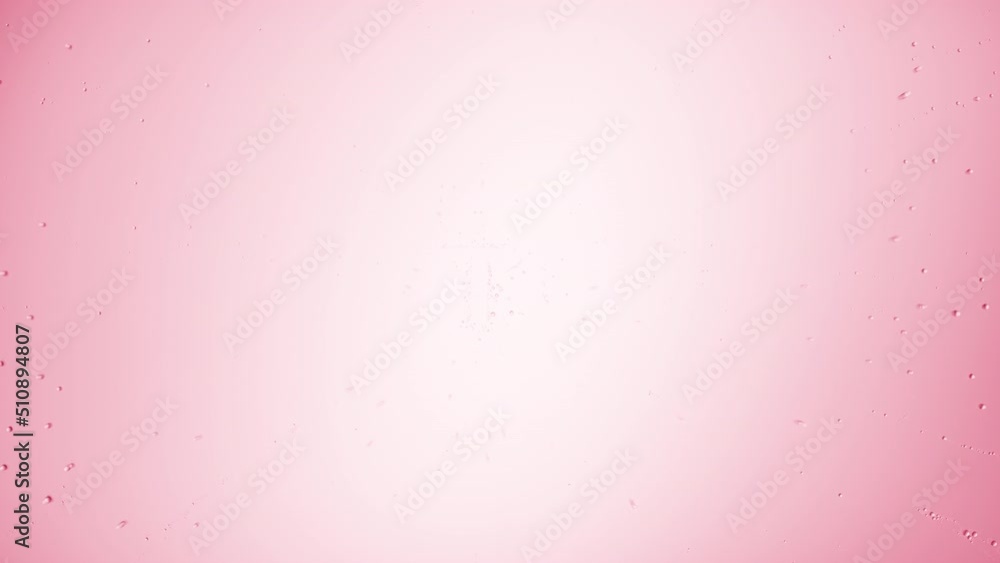 Text moisturize printed on the wet glass blown off with air stream on pink background | moisturizer commercial concept Text moisturize printed on the wet glass blown off with air stream on pink background | moisturizer commercial concept