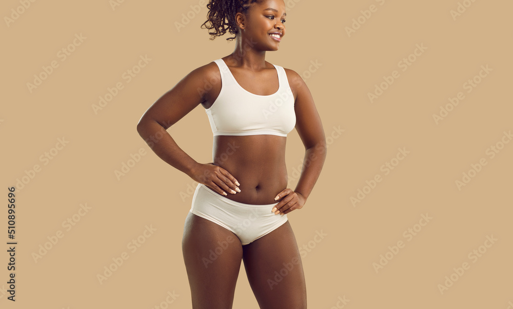 Foto de Image of smiling teenage girl in sports underwear do Stock