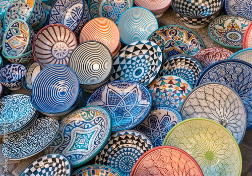 Painted ceramic plates on sale in Marrakech souks, Marrakesh, Morocco