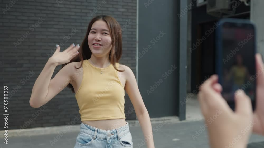Gen z vlogger influencer asia teen girl trending relax smile moving dance at city park street record on IG reel tiktok instagram app young youtuber play fun joy selfie post show share viral vlog video Gen z vlogger influencer asia teen girl trending relax smile moving dance at city park street record on IG reel tiktok instagram app young youtuber play fun joy selfie post show share viral vlog video
