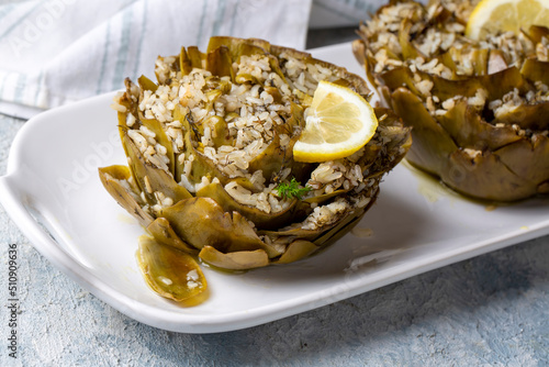 Fresh delicious stuffed artichoke, best Turkish food. Turkish name; Zeytinyagli Enginar Dolmasi photo