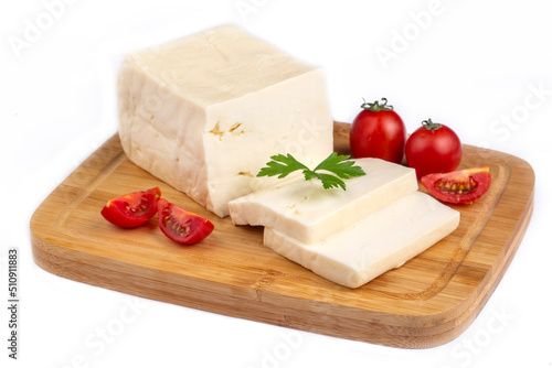 Feta greek turkish cheese on chopping board white background