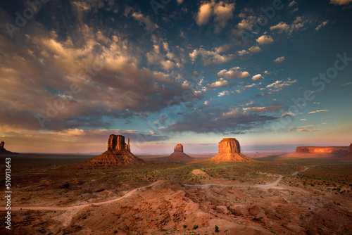 Fototapeta Sunset effect on Monument Valley, barren lands and deserts on the border between