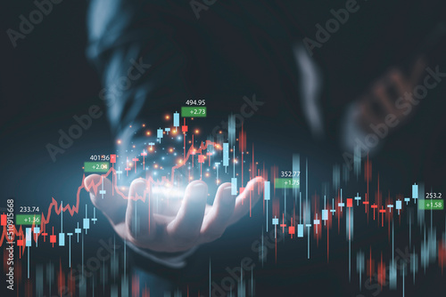 planning and strategy, Stock market, Business growth, progress or success concept. Hand of Businessman or trader touching showing a growing virtual hologram stock on smartphone, invest in trading.