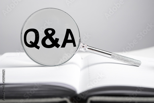 QnA, q and a concept. Questions and answers on book. High quality photo photo