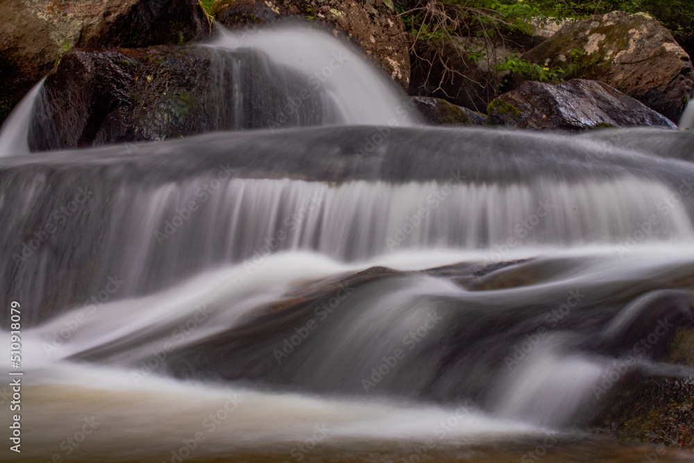 Fototapeta premium Cascading mountain creek