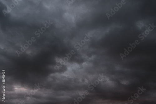 Abstract, dramatic background dark storm clouds.