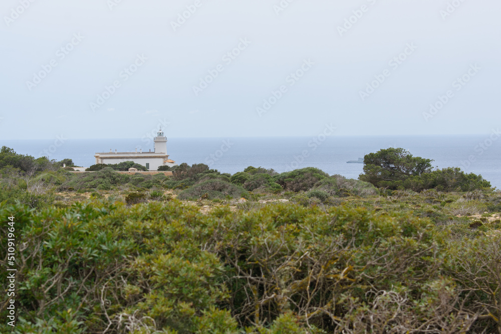 Lighthouse at Far de Cap Blanc in Mallorca, Spain Lighthouse at Far de Cap Blanc in Mallorca, Spain