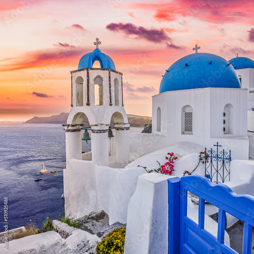 Europe summer destination. Traveling concept, sunset scenic famous landscape of Santorini island, Oia, Greece. Caldera view, colorful clouds, dream cityscape. Vacation panorama, amazing outdoor scenic
