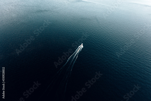 Aerial view of speed boat in the sea . High quality photo