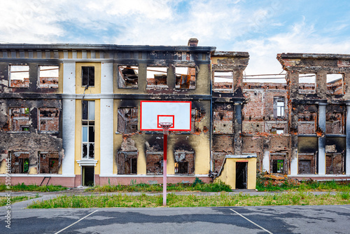 School building destroyed by Russian troops. War in Ukraine. Destruction of civilian infrastructure.