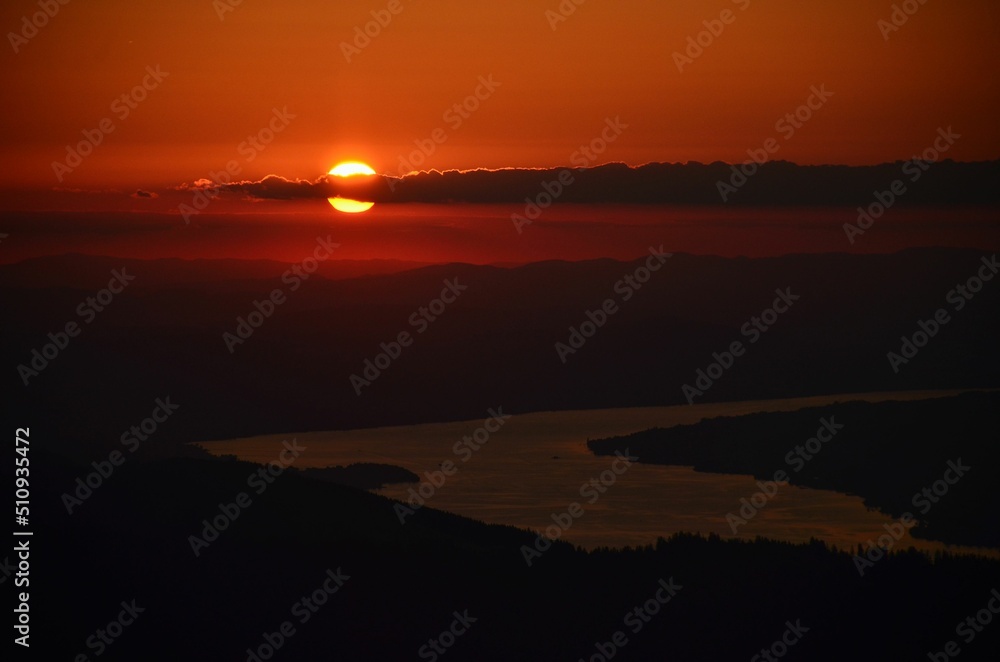 Fototapeta premium beautiful sunset over lake zurich. Photo from the Bockmattli mountain. Breathtaking evening atmosphere. Wanderlust