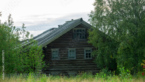 Wooden architecture. Old log houses of the 19th century. Arkhangelsk near-polar regions. Russia photo