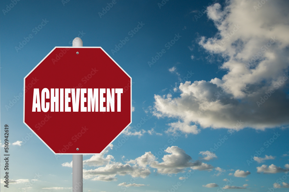 Obraz premium Red stop sign with the word Achievement on a blue sky background.