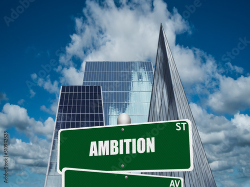 Street sign with the word Ambition on downtown financial district background.