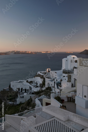 View of the whitewashed and picturesque small houses and hotels of Oia Santorini