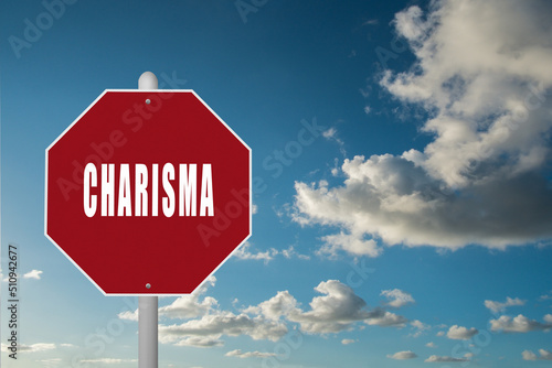 Red stop sign with the word Charisma on a blue sky background.