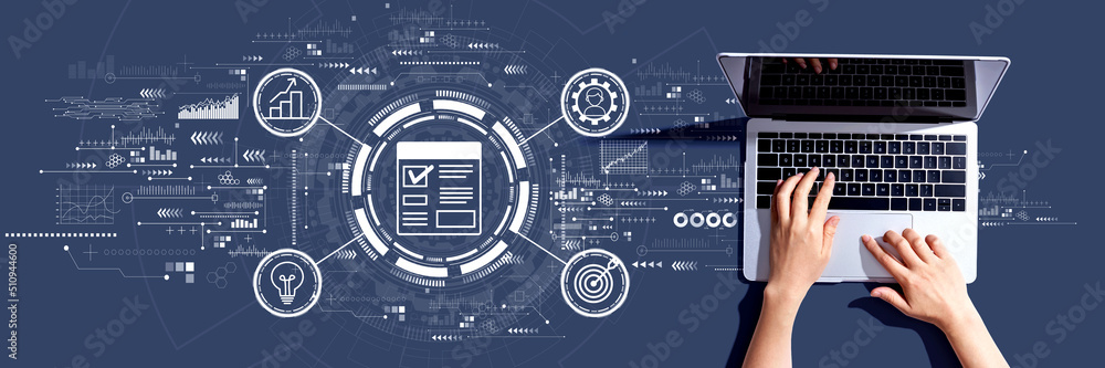 Project management theme with person using a laptop computer Project management theme with person using a laptop computer