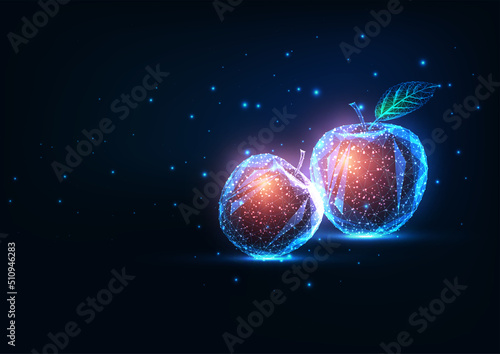 Abstract healthy eating, lifestyle concept with glowing two red apples and copy space on dark blue