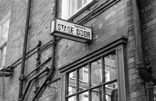 Theatre stage door sign in black and white