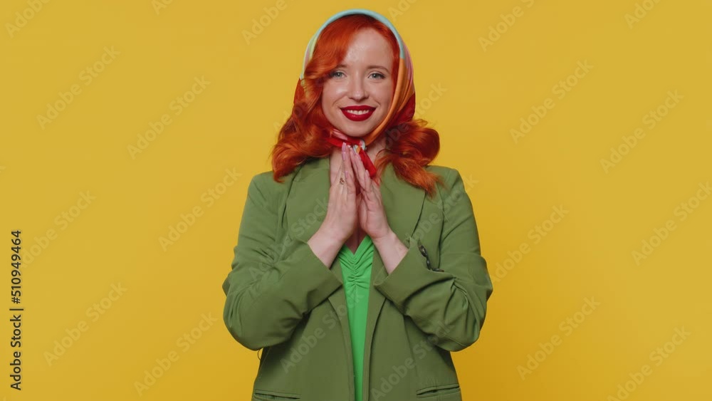 Sneaky cunning woman with tricky face gesticulating and scheming evil plan, thinking over devious villain idea, cunning cheats, jokes and pranks. Redhead girl on yellow studio background alone indoors Sneaky cunning woman with tricky face gesticulating and scheming evil plan, thinking over devious villain idea, cunning cheats, jokes and pranks. Redhead girl on yellow studio background alone indoors