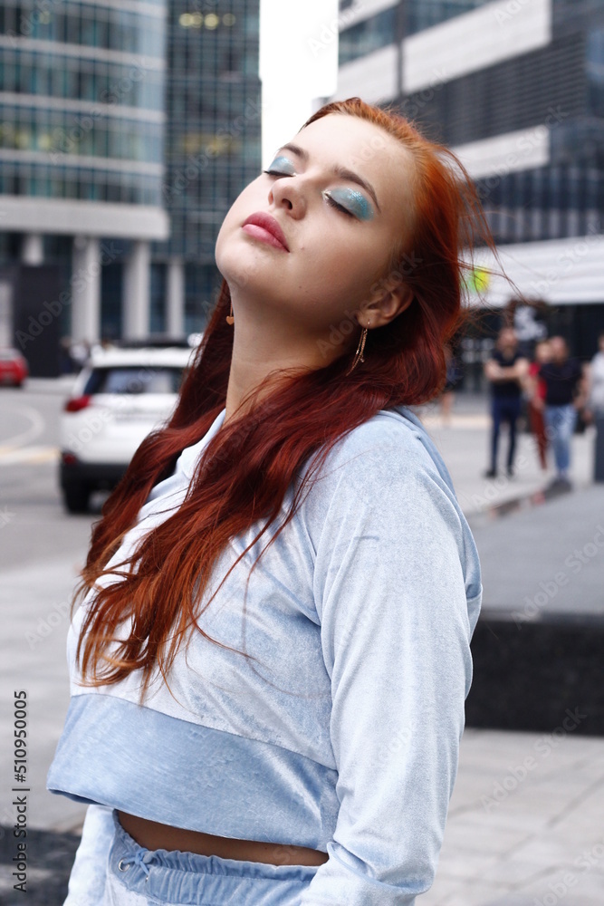Fototapeta premium portrait of a young woman beauty girl red hair