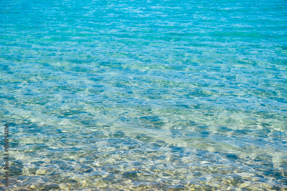 Natural blue sea water summer vocation background.