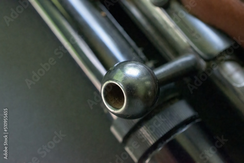 Close up of a Bolt Action on a .22 Rifle. Macro of rifle scope and bolt action.