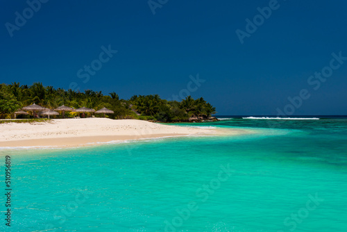 Fototapeta Naklejka Na Ścianę i Meble -  Perfect tropical island Maldives paradise beach Beautiful palm trees and tropical beach