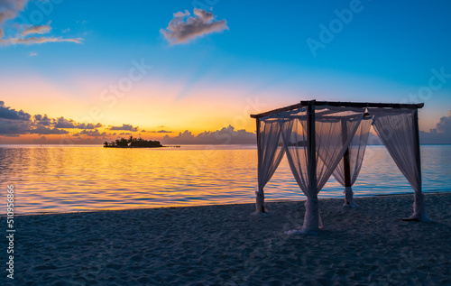 Sunset on Maldives paradise island holiday resort © allouphoto