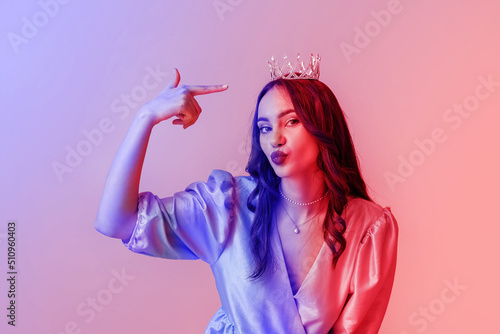 Beautiful young woman in st...