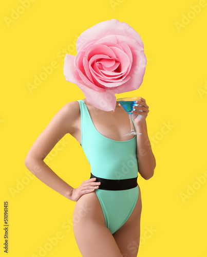 Woman with blooming rose fl...