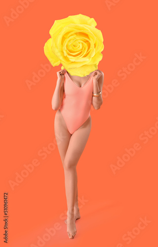 Woman with yellow rose flow...