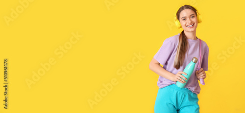 Sporty young woman with bot...
