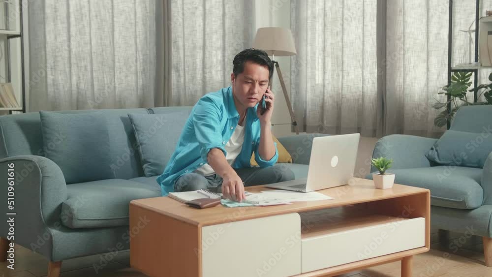 Asian Man With A Laptop Answering The Call And Looking At The Bill Before Having Headache
Asian Man With A Laptop Answering The Call And Looking At The Bill Before Having Headache
