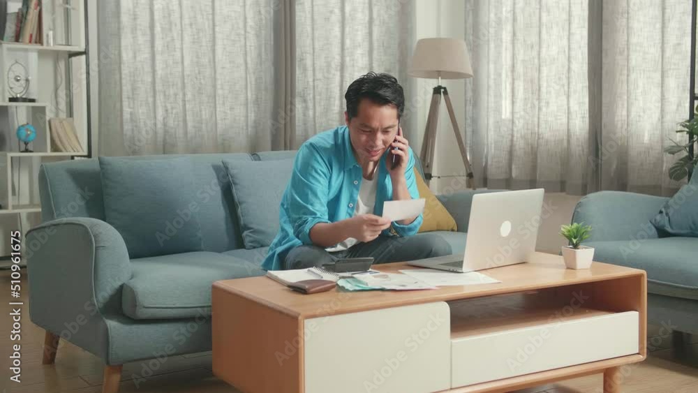 Asian Man With A Laptop Answering The Call And Looking At The Bill Then Being Happy
Asian Man With A Laptop Answering The Call And Looking At The Bill Then Being Happy
