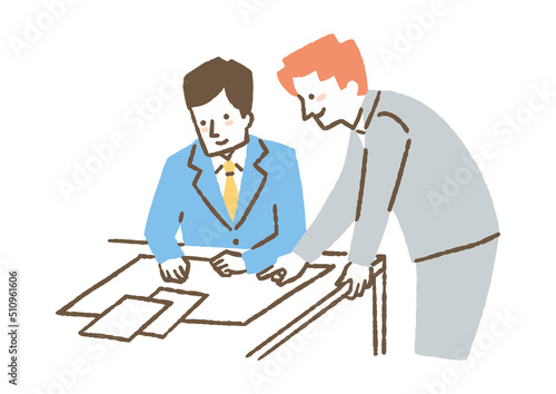 仕事で指示をしている男性上司_色