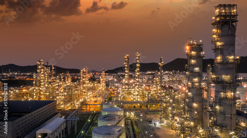 Oil and gas petrochemical industrial refinery plant  Oil and gas storage tank refinery petrochemical factory with refinery plant manufacture structure  White Industrial tanks for petrol and oil.