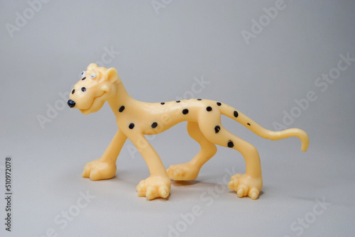 Yellow leopard model isolated on studio lighting shot  animal toys plastic