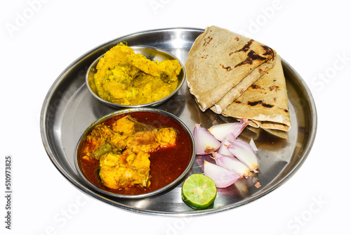 Rohu fish plates, onion, lemon and roti in the plate, fish plate isolated on white background. In India
