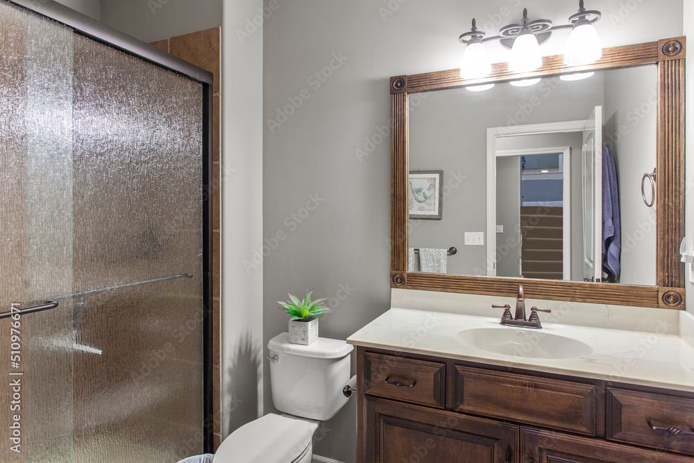 interior of bathroom with granite counter tops and mirror interior of bathroom with granite counter tops and mirror