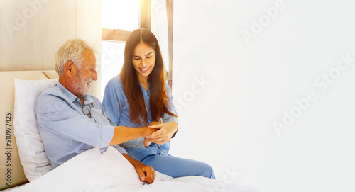 Nurse examined the old man's pulse and smiled contentedly.