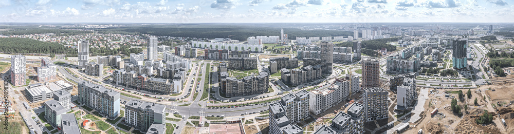 aerial panoramic view of new urban residential district with apartment buildings and roads